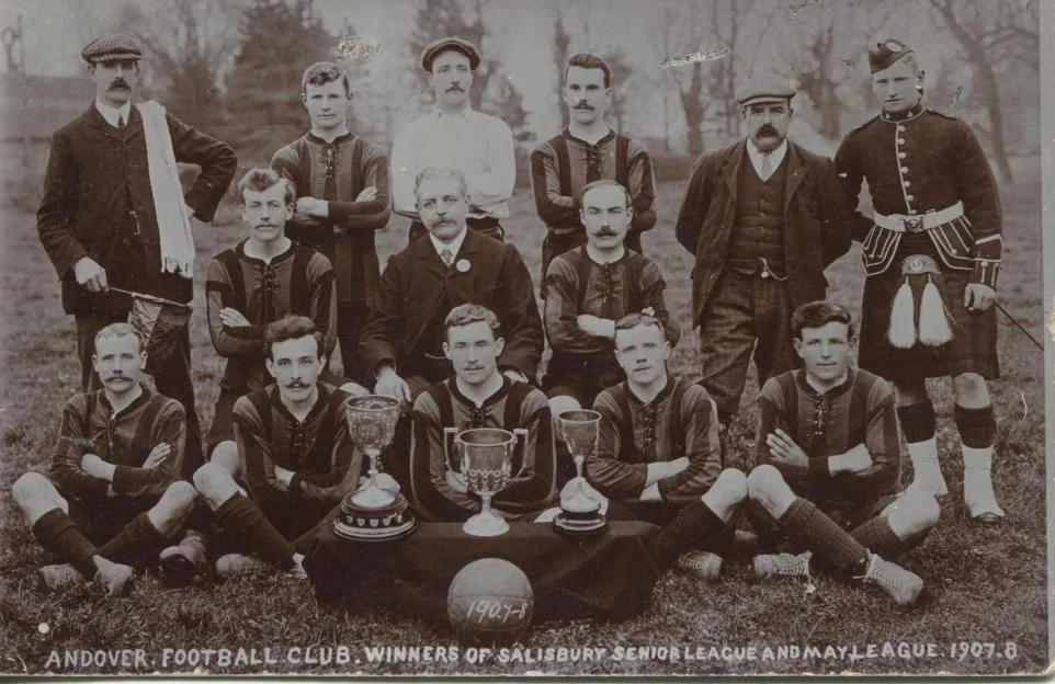 Andover Football Club team photograph, 1907–08, with three trophies